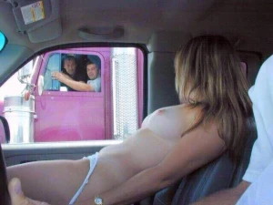 Girl flashes for truck driver