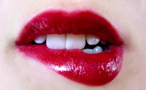 Biting her lip