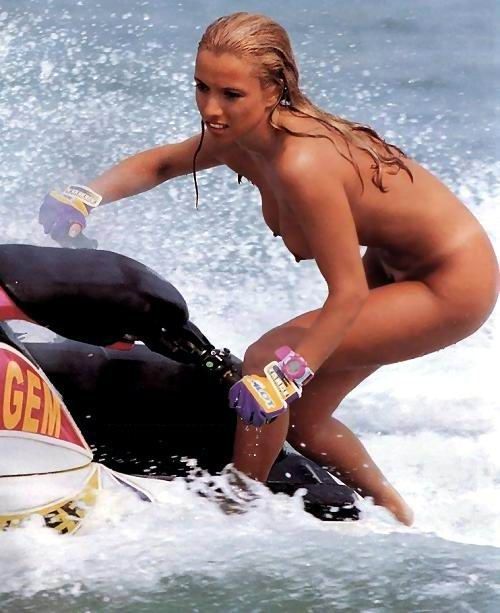 She's naked on some kind of jetski.