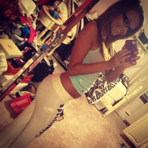 sexy nerdy girl in tight white yoga pants showing off her amazing ass!