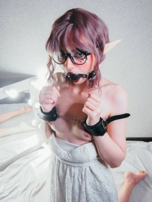 Cuffed and gagged elven slave