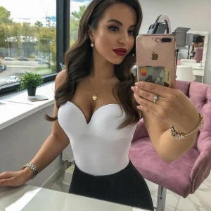 Busty brunette looking crazy hot!