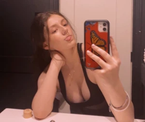 Teen selfie tongue out cleavage