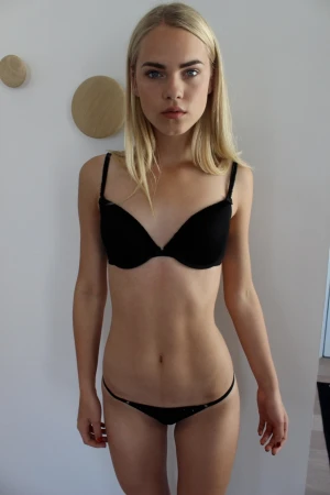 Skinny young & petite model in lingerie