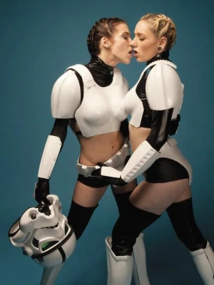 Superb lesbian blonde in hot costume photo
